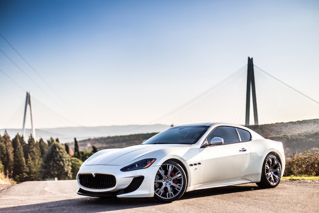 A White Modern Sport Car Parking On The Road