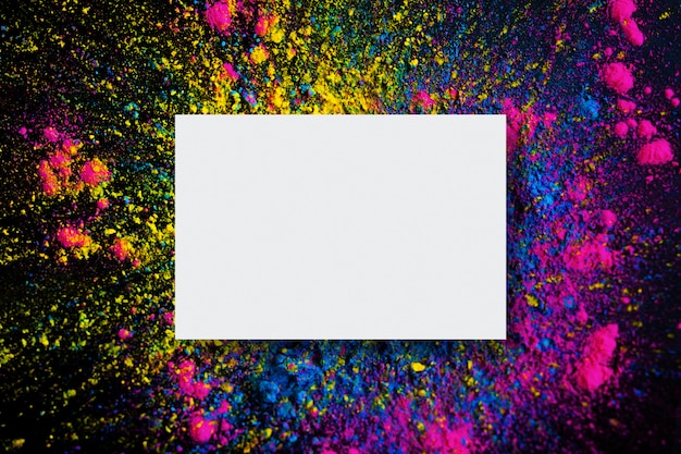 Abstract background of holi color explosion with empty frame Free Photo