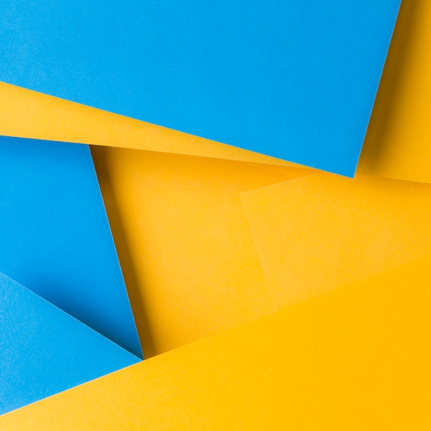 無料の写真 | 青と黄色のテクスチャ紙の背景の抽象的な背景
