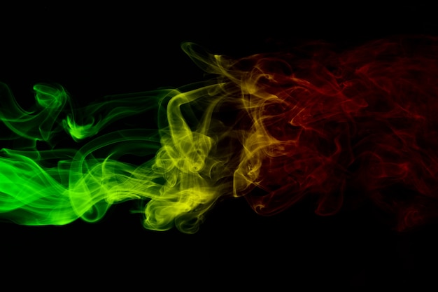 抽象的な背景の煙の曲線と波のレゲエの色 プレミアム写真