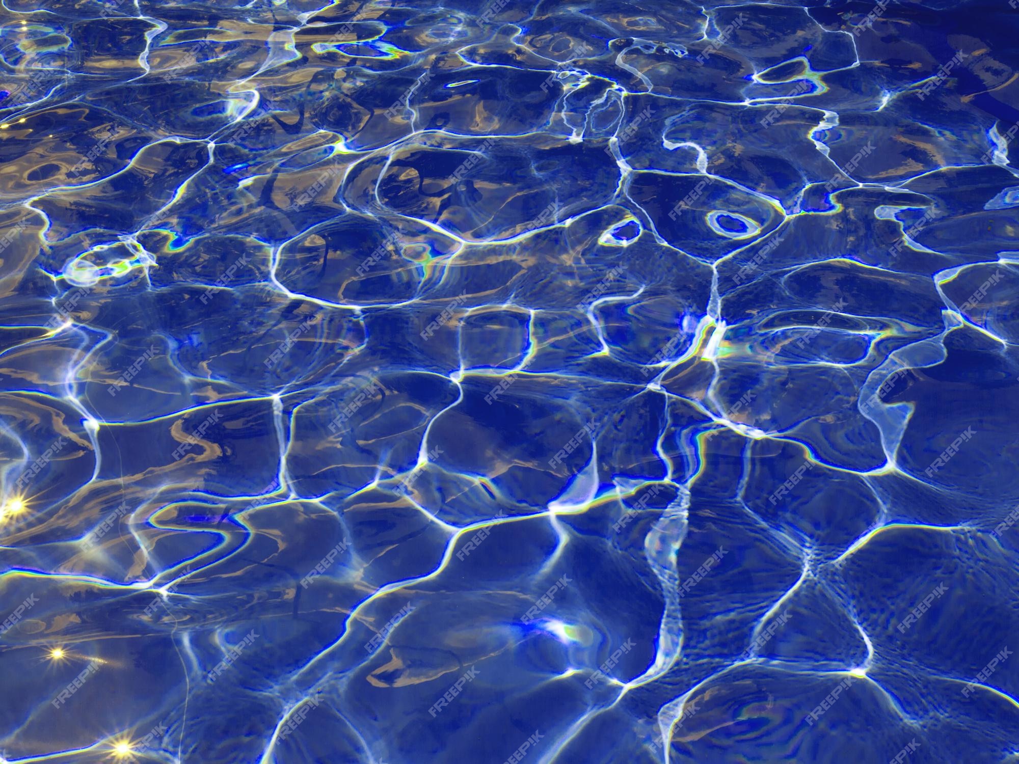 Premium Photo | Abstract blue texture of swimming pool water with ...