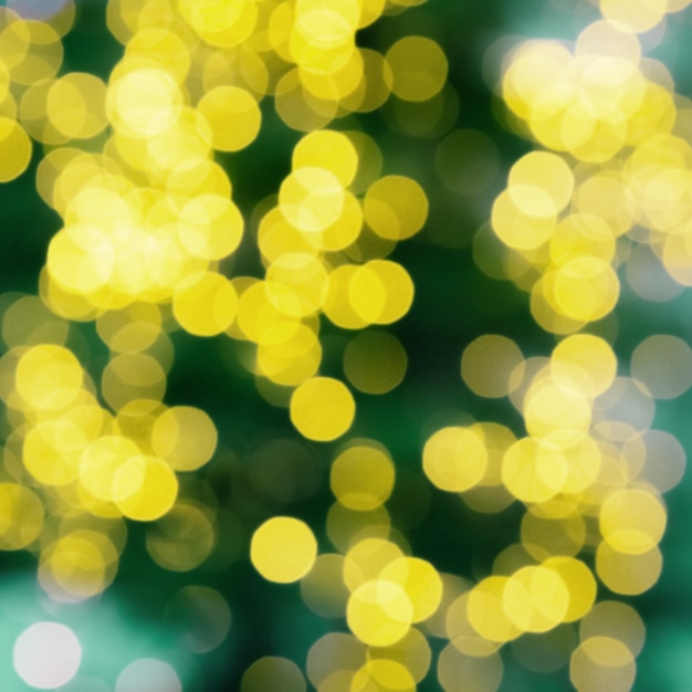 Premium Photo | Abstract blur yeelow lights on green background ...