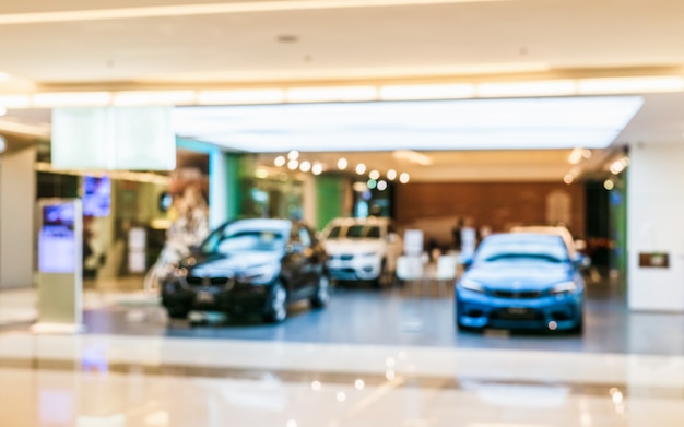 Premium Photo | Abstract blurred car. blur image of car in the showroom ...