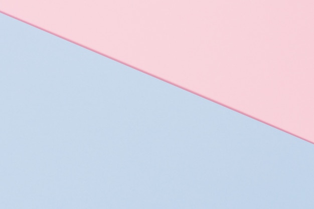 水色とパステルピンク色の抽象的な色の紙のテクスチャ背景 プレミアム写真