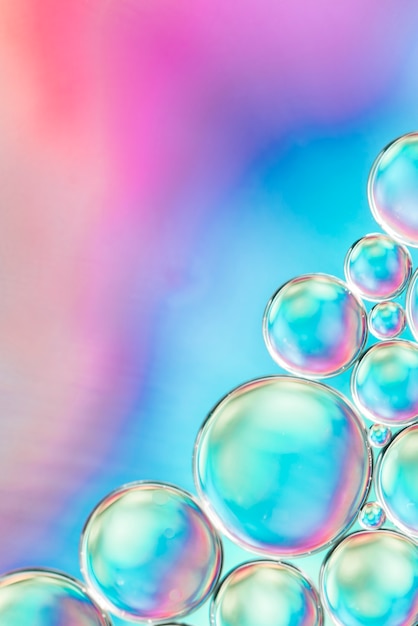 Abstract colorful air bubbles in water on saturated ...