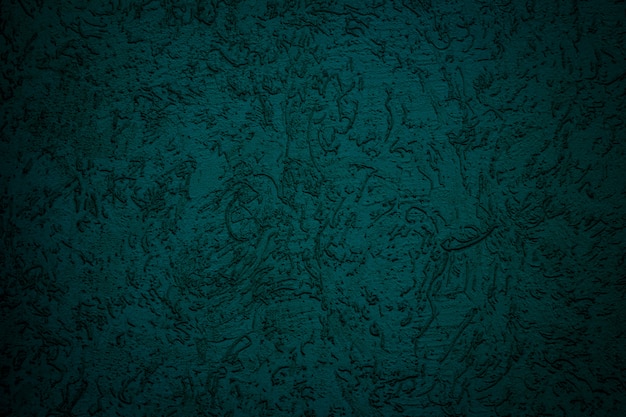 Premium Photo | Abstract dark green background. rough textured plaster