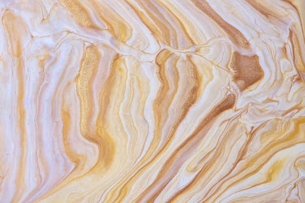 抽象的な流体アートの背景のベージュと金色 液体大理石 白のグラデーションでキャンバスにアクリル画 水彩画の背景 プレミアム写真
