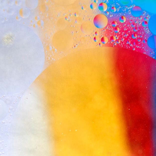 Free Photo | Abstract pattern of colored oil bubbles on water