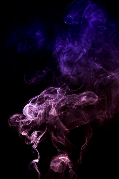 Free Photo | Abstract pink and blue smoke spread on black background