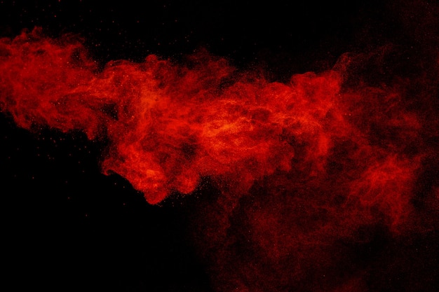 Premium Photo | Abstract red powder explosion on black ...