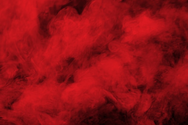 Abstract red smoke on black background. Photo | Premium Download