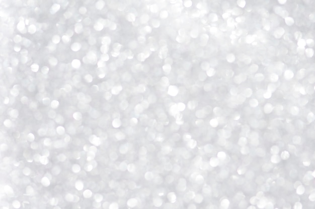 Premium Photo | Abstract silver glitter light blurred background.