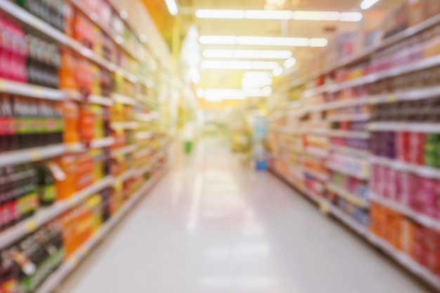 Premium Photo | Abstract supermarket aisle with soft drink bottles ...