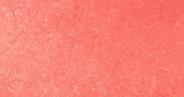 Abstract textured background in living coral color of the year 2019 Premium Photo