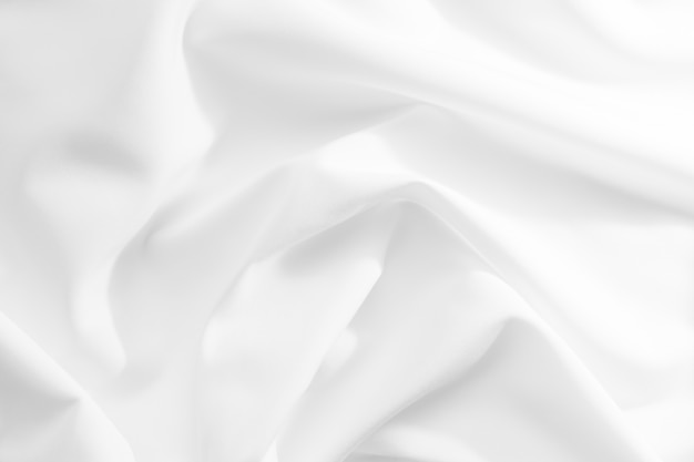 抽象的な白い布のテクスチャの背景 柔らかい波 サテン シルク コットンのしわ プレミアム写真