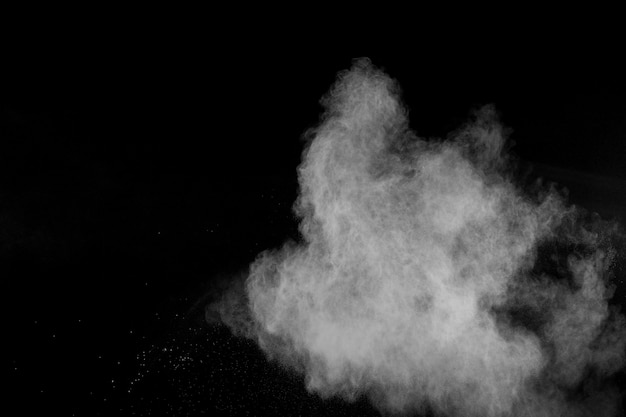 Premium Photo | Abstract white powder explosion against black ...