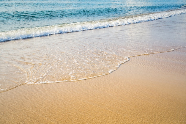 Abstract white sea waves at sea shore beach background | Premium Photo