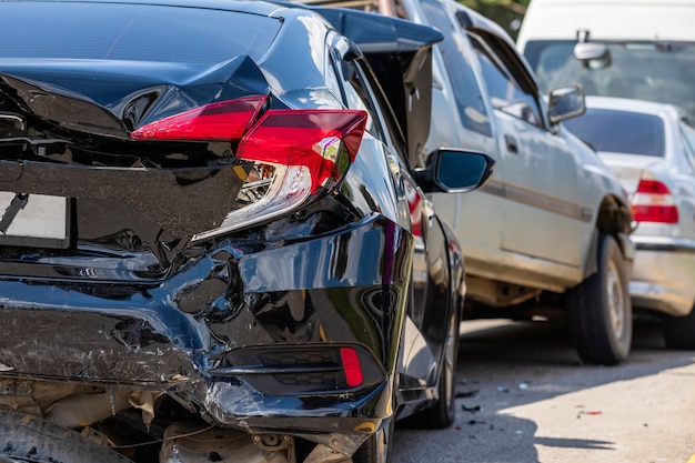 Accident involving many cars on the road Premium Photo