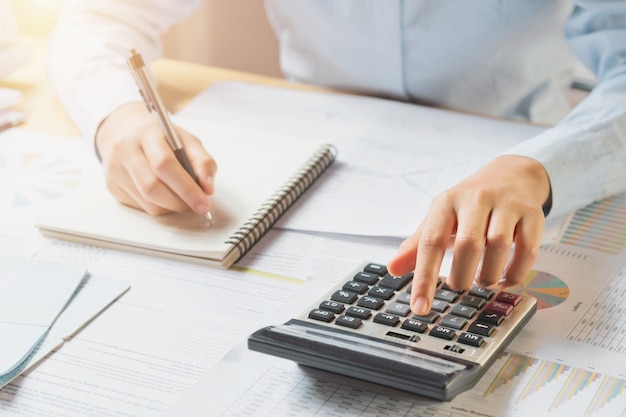 Premium Photo | Accountant working on desk in office