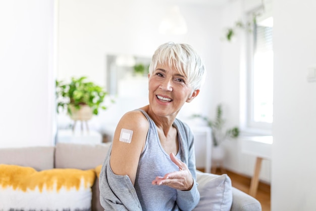 Premium Photo | Adhesive bandage on arm after injection vaccine or ...