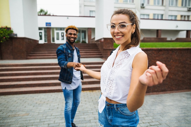 Free Photo | Adorable couple holding hands and posing