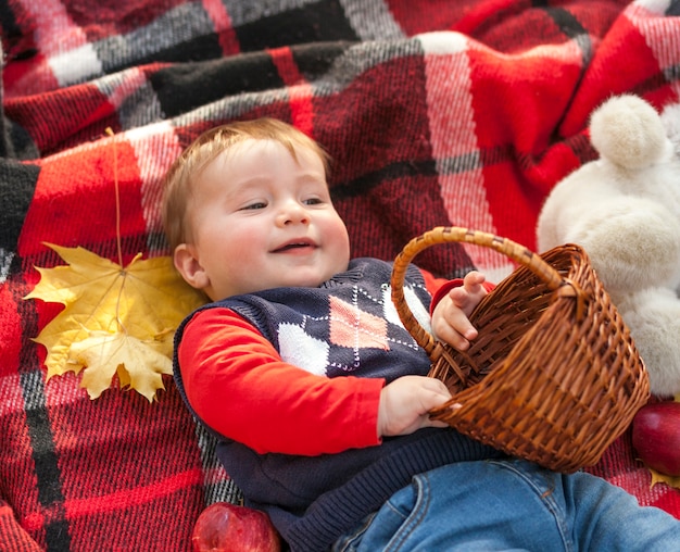 baby holding basket