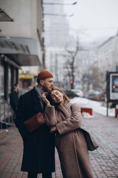 Adult loving couple walking  on a street  Free Photo 