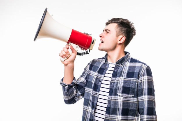 Free Photo | Adult man holds red with white megaphone and talk