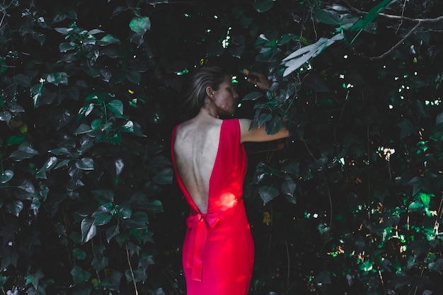 Free Photo Adult Woman Standing In Bushes