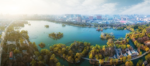 Premium Photo | Aerial photography of modern city parks and lakes in ...