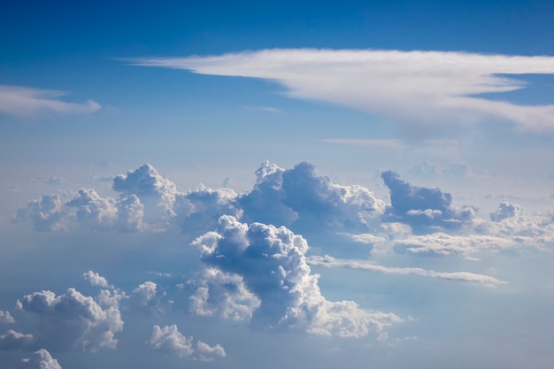 Premium Photo | Aerial view of clear blue bright sky with big cumulus ...