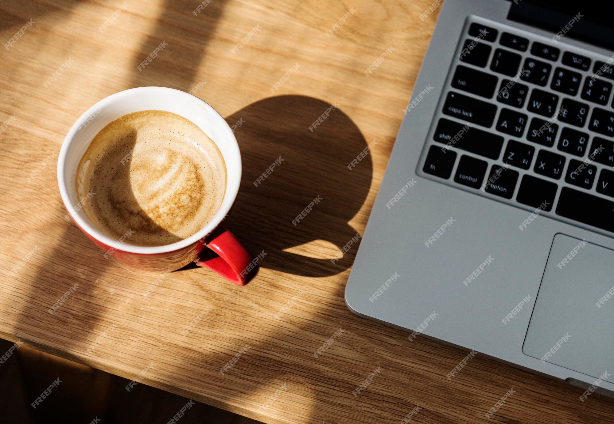 Premium Photo | Aerial view of coffee by computer laptop