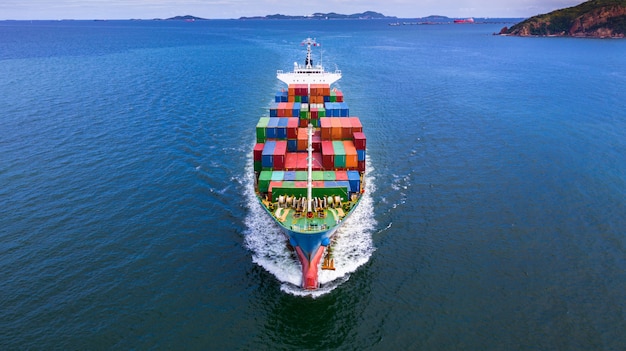  Aerial view container ship carrying container in import export business.