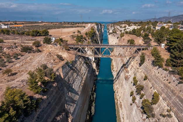 Premium Photo | Aerial view of a deep narrow corinth channel with blue ...