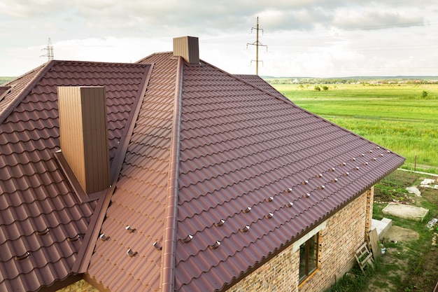 Premium Photo | Aerial view of house roof structure covered with metal