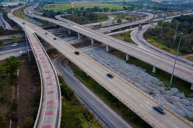 Premium Photo | Aerial view interchange freeway overpasses and motorway ...