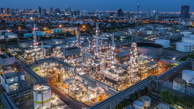 Aerial view oil refinery, refinery plant, refinery factory at night. Premium Photo