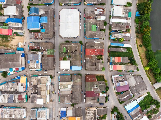 Premium Photo | Aerial view of roof residential with traffic road ...