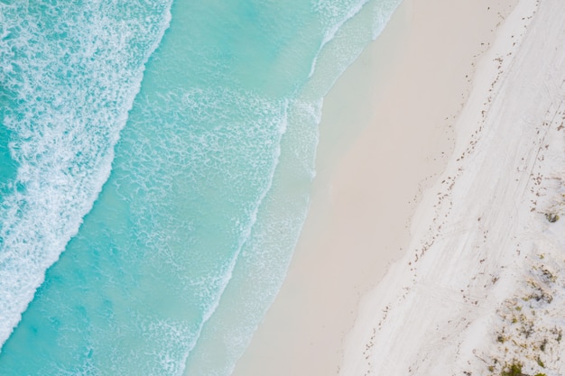 Premium Photo | Aerial View Of Sandy Beach With Clear Blue Water