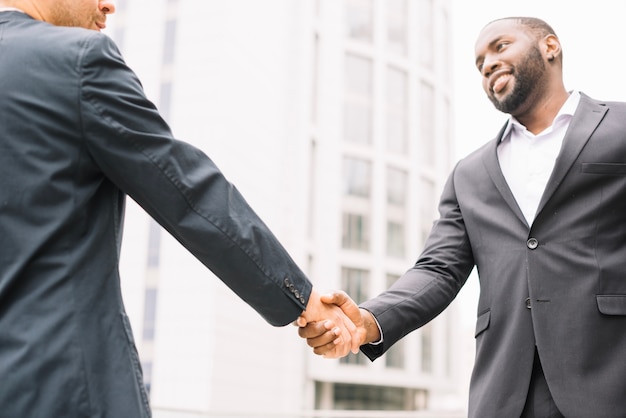 African American Man Shaking Hand Of Colleague Photo Free Download