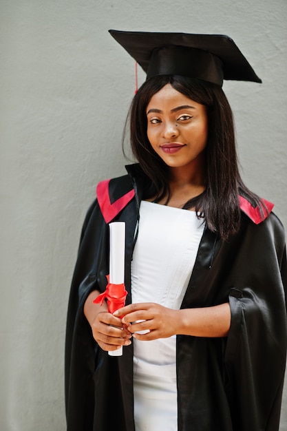 Premium Photo | African american woman in a black robe at graduation