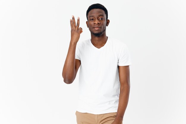 Premium Photo | African man in white tshirt with hands gesturing with ...