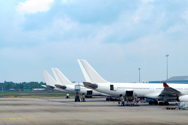 Premium Photo | Aircraft parked at the airport