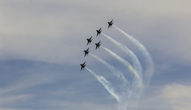 Premium Photo | Aircraft sky show airshow speed clouds airplane fly ...