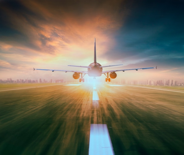 Premium Photo | Airplane flying over airport runway