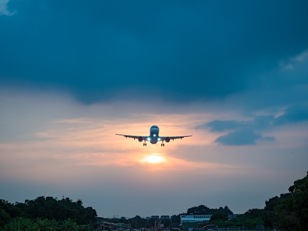 Premium Photo | Airplane landing in taipei city, taiwan.