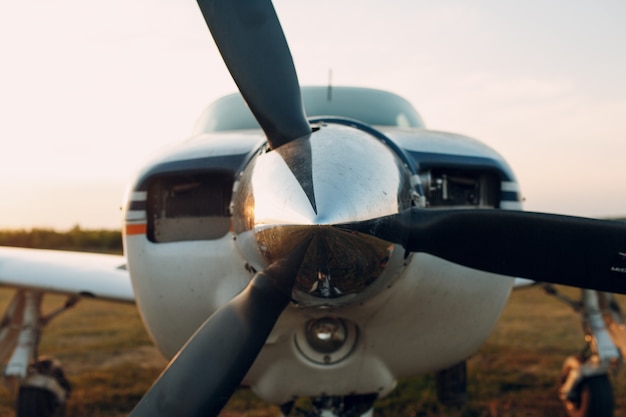 Premium Photo | Airplane motor with propeller blades and air intake.