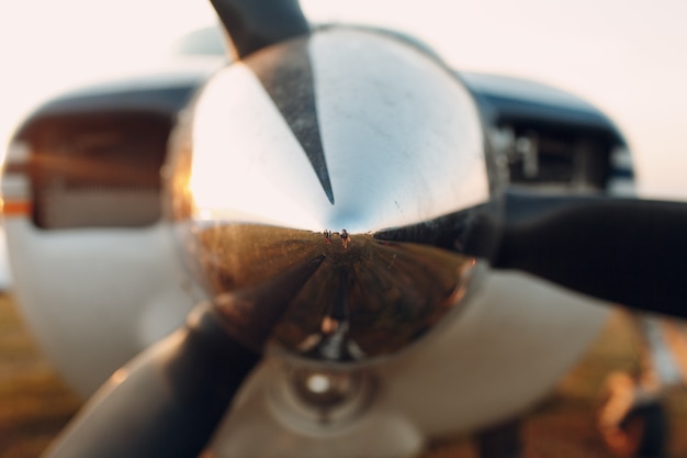 Premium Photo | Airplane motor with propeller blades and air intake.