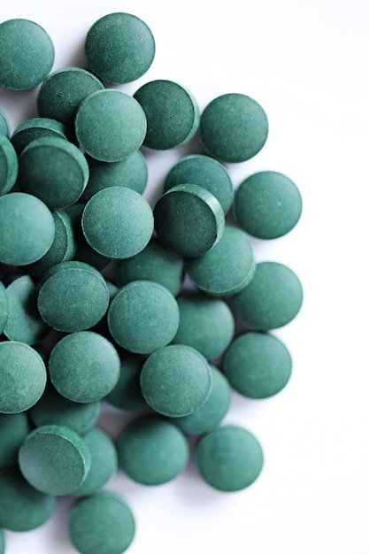Algae spirulina tablets. super food concept. Premium Photo