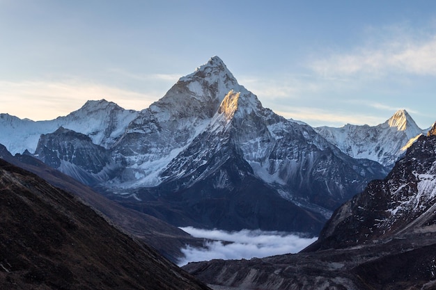 Premium Photo | Ama Dablam Mountain At Sunrise And Blue Sky. Sun ...